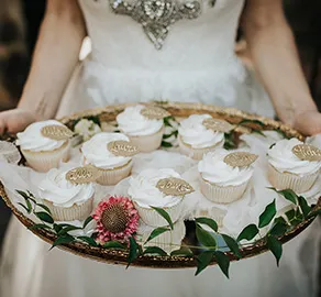 Wedding cupcakes on gold plater