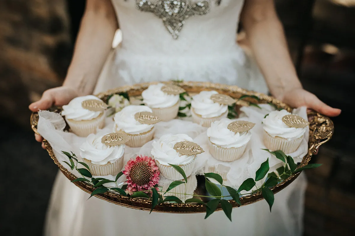 Wedding cupcakes on gold plater