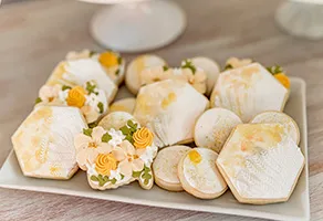 Yellow floral and watercolored cookies