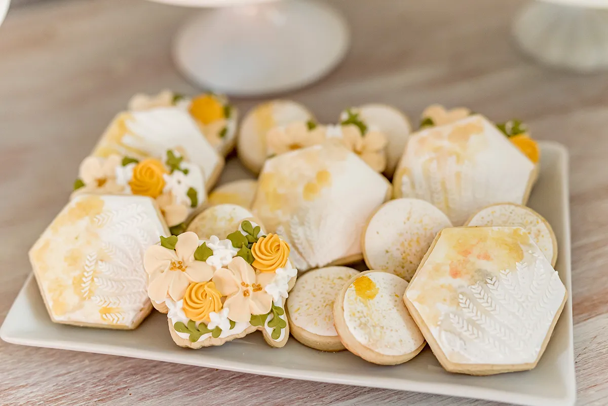 Yellow floral and watercolored cookies