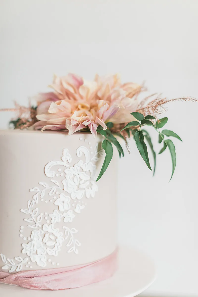 Lace piped wedding cake